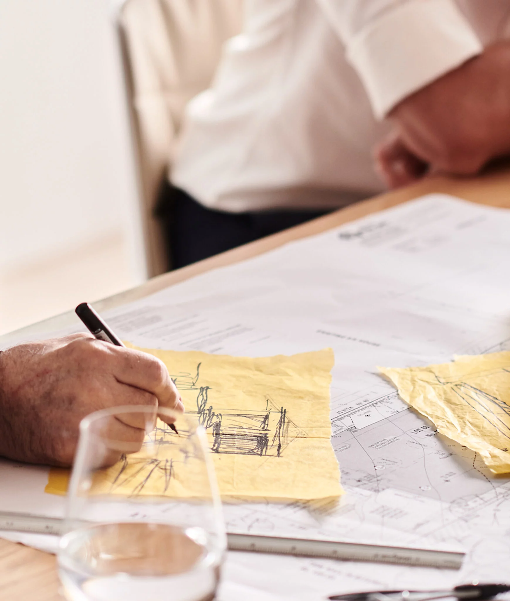 Architect sketching a bespoke home design